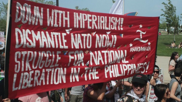 62. Philippinesusa-at-anti-nato-march-banner-photo-by-jonna-baldres Philippines.jpg