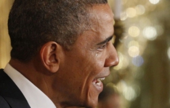 9. Obama larme.jpg