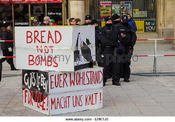 57. police-cordon-and-signs-banners-on-protest-rally-anti-nato-peaceful-ehktj0.jpg